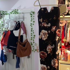 Strapless black floral dress with a high slit